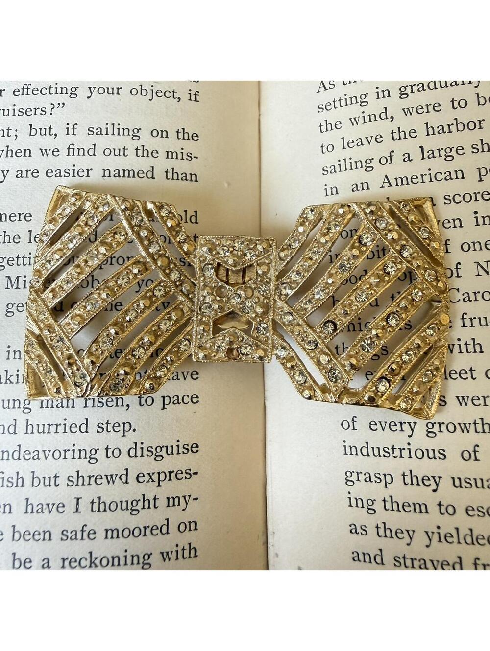 Vintage Signed Nancy Katz Rhinestone Bow Clip Gold Tone Art Deco Glam Statement